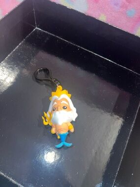 King Triton PVC Keychain Charm — Yellow, White, Blue